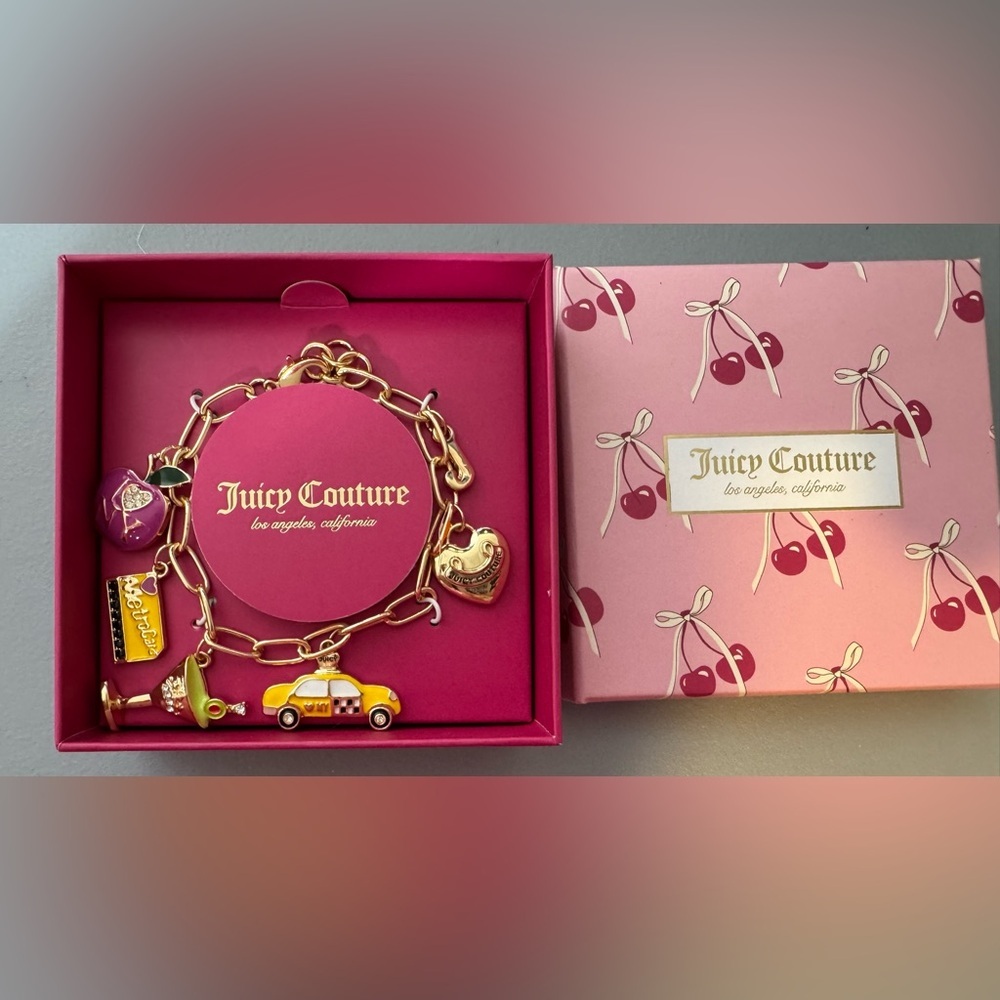 Juicy Couture Gold New York charm Bracelet with charms